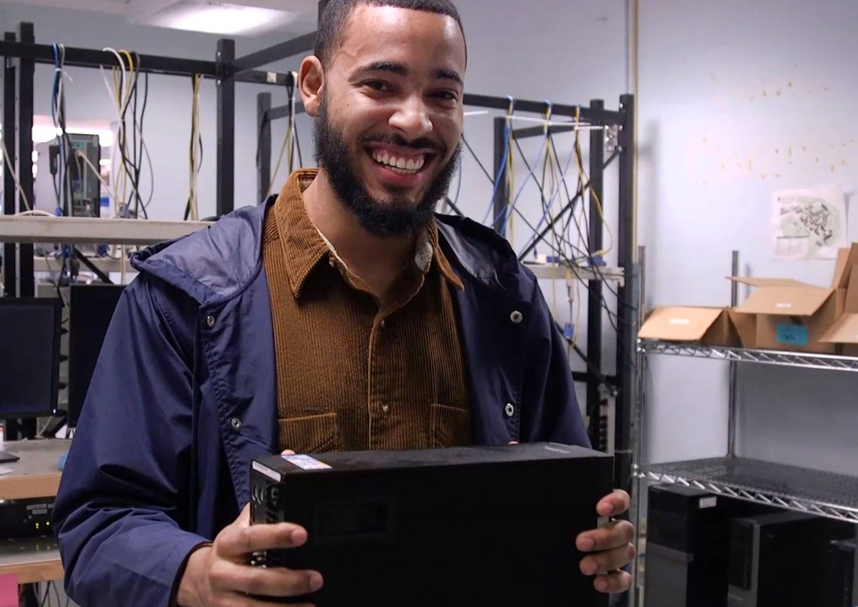 Hector Rosario with computer