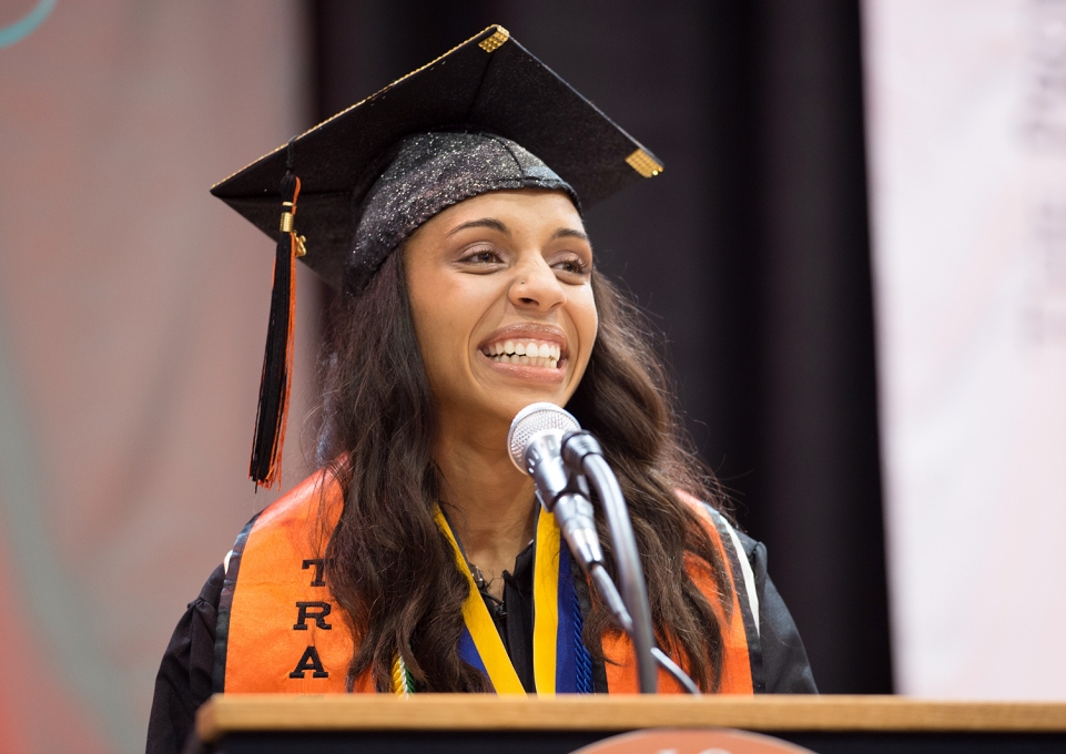 Sasa Vann at the podium during commencement